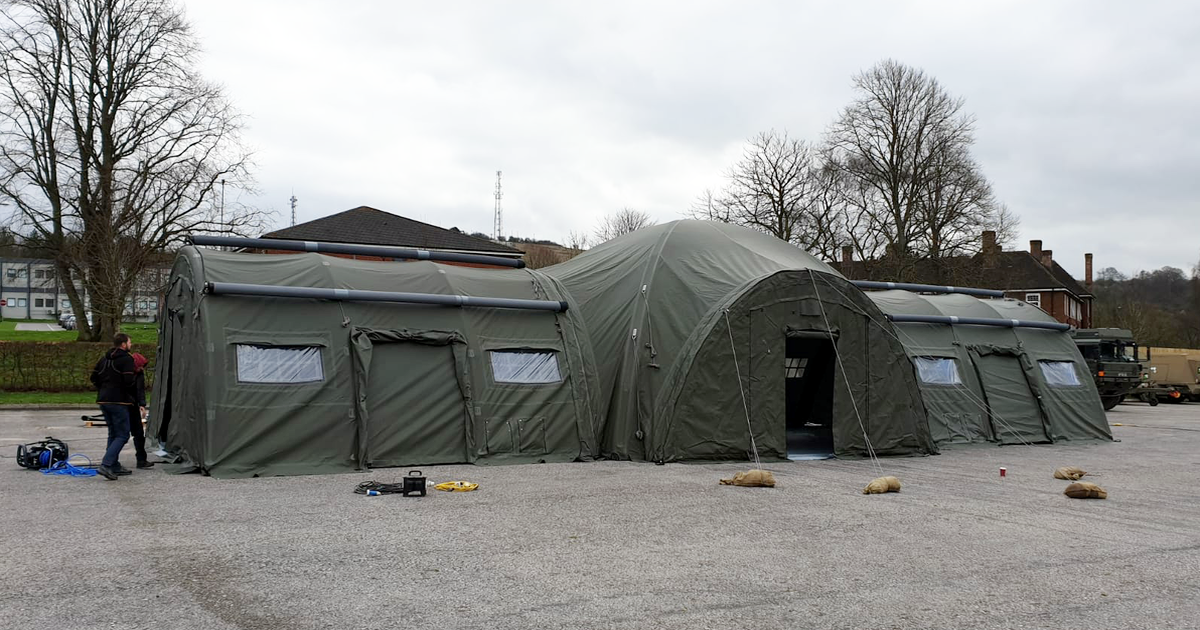 Military Command Post with ISO Container Section. 3 Heavy duty inflatable tents plus an ISO container and a connecting module to make an X shaped building